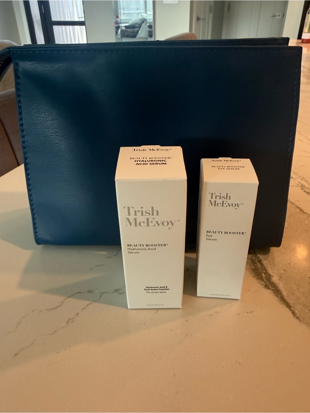Trish McEvoy Navy Blue Pouch with NIB eye serum and NIB hyaluronic acid serum